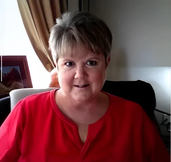 Author Patricia Gable wearing a red top